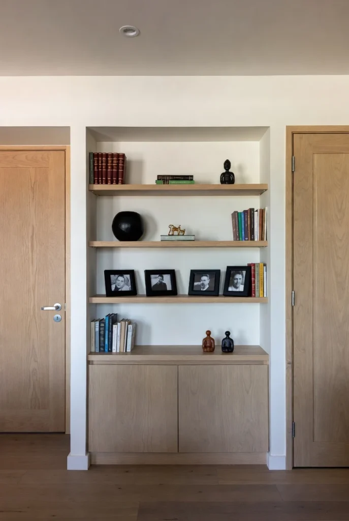 Recessed Bookshelf with Sculptural Accents